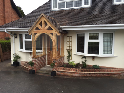 New front doorway with gabled canopy porch photo 1