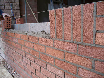 The new brickwork is matched to existing brick colour & laying design