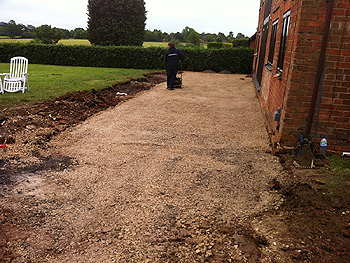 Compacting the ground prior to laying the Indian Stone slabs