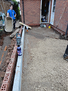 Compacting the base of the extension floor 2