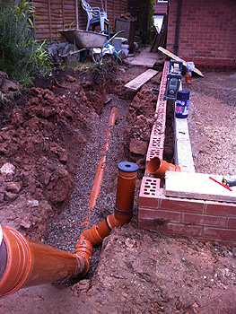 Drainage pipes are laid and connected to existing system 2