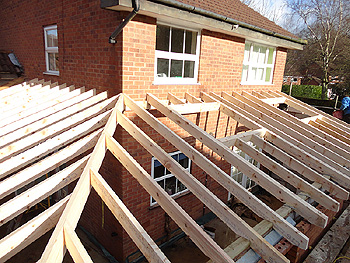 Our joinery team incorporate the spaces in the roof for the two Velux windows