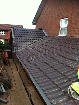 Finishing off the roof tiling and flashing 2