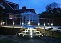 Large Decking Area With Feature Steps and Stone Patio Paving 2
