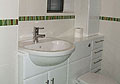 HD Property Services fitted bathroom with built in toilet and sink